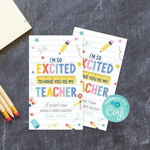 May include: Two printable cards with a school-themed design. The cards feature a ruler, pencil, and stars. The text on the cards reads "I'm so excited to have you as my teacher".