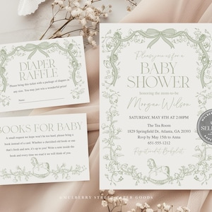 Pode incluir: Um conjunto de convites para chá de bebê com um design floral e laços em verde suave e creme. O conjunto inclui um convite, um cartão de rifa de fraldas e um cartão de livros para bebês. O texto do convite diz "Baby Shower".