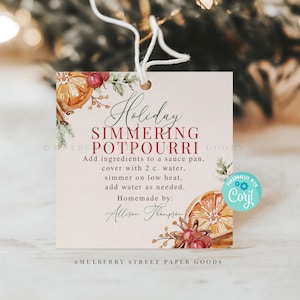 Könnte beinhalten: Ein druckbarer Geschenkanhänger mit einem Aquarelldesign aus Orangen, Zimtstangen und Beeren. Der Text lautet "Festliches Duftmischwerk" und enthält Anweisungen zur Herstellung des Duftmischwerks. Der Anhänger ist mit dem Namen "Allisen Thompson" und dem Text "Selbstgemacht von:" personalisiert.