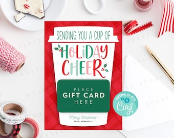 May include: A red and white plaid gift card design with a green coffee cup illustration. The text reads "Sending you a cup of Holiday Cheer" and "Place Gift Card Here". The card is personalized with the text "Merry Christmas! From Annabelle".