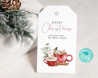 May include: White gift tag with red text that says "Merry Christmas" and "with love from, The Miller Family". The tag features a watercolor illustration of two red mugs filled with hot chocolate topped with marshmallows and whipped cream.