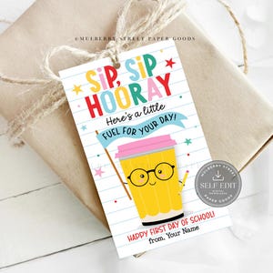 May include: A rectangular gift tag with a white background featuring blue horizontal lines. The text reads SIP, SIP HOORAY, Here's a little FUEL FOR YOUR DAY!, and HAPPY FIRST DAY OF SCHOOL! from, Your Name. A yellow pencil cup character with glasses is shown.
