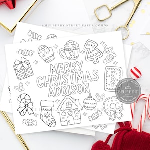 May include: Black and white Christmas colouring page with the text "MERRY CHRISTMAS ADDISON" surrounded by festive illustrations of a gift, candy cane, gingerbread house, and ornaments. Includes a red gift box and candy canes.
