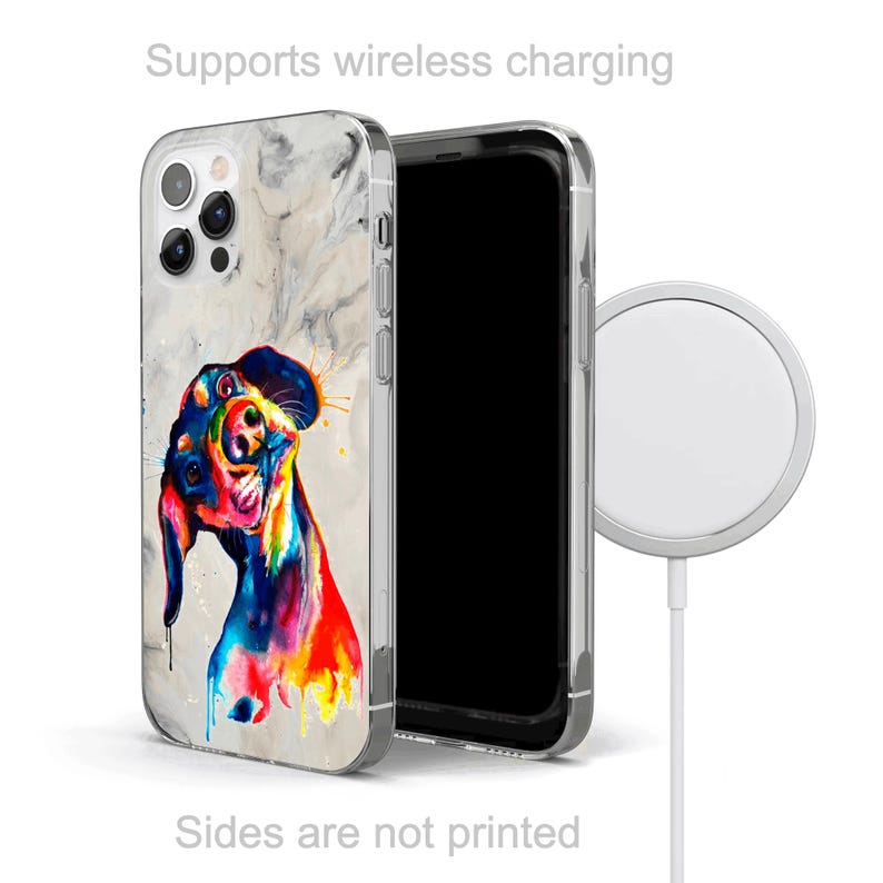 May include: A colorful illustration of a dog on a white marble phone case. The case is compatible with wireless charging. The text "Supports wireless charging" is printed above the case. The text "Sides are not printed" is printed below the case.