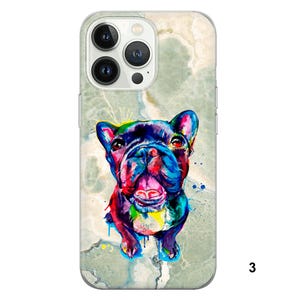 May include: A colorful, abstract painting of a French Bulldog on a light gray marble background. The dog is painted in shades of blue, green, yellow, red, and purple. The dog is looking up at the camera with its tongue sticking out.