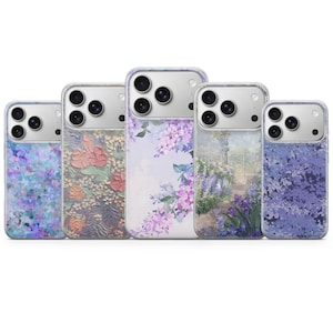 May include: A collection of five phone cases with floral and landscape designs. The cases feature a variety of colors, including blue, purple, and pink. Each case has a clear border and a camera cutout.