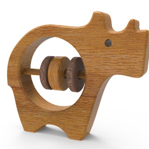 Woodworking Plans for a Wooden Baby Rattle in the shape of an Rhinoceros. These beginner friendly woodworking plans are an easy project and make a thoughtful gift for grandchildren and friends.