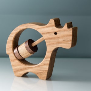 Handmade and homemade Rhino wooden Baby Rattle. Made using our simple woodworking plans, that are beginner friendly and easy to follow. Makes a great gift that will be treasured for a lifetime.