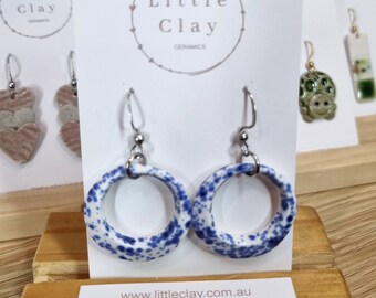 Handmade ceramic hanging earrings - blue and white speckled hoops