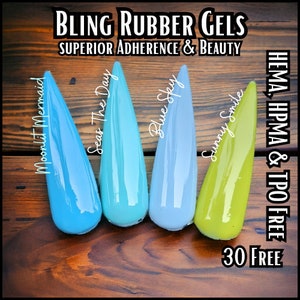 May include: Four bottles of nail polish in different colors: blue, teal, light blue, and yellow. The bottles are labeled with names: Moonlit Mermaid, Seas The Day, Blue Sky, and Sunny Smile. The text "BLING RUBBER GELS SUPERIOR ADHERENCE & BEAUTY" is at the top of the image. The text "HEMA, HPMA & TPO FREE 30 FREE" is at the bottom of the image.