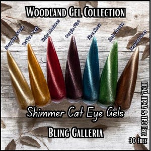 May include: Woodland Gel Collection: Shimmer Cat Eye Gels by Bling Galleria. Eight bottles of nail polish with a cat eye effect in various colors, including gold, red, purple, blue, green, and brown. The bottles are arranged in a row on a wooden surface. The text "HEMA, HPMA & TPO FREE" and "30 FREE" are visible in the lower right corner of the image.