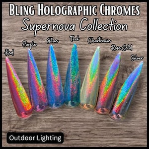 May include: A collection of holographic chrome powders in various colors, including red, purple, blue, teal, chartreuse, rose gold, and silver. The powders are arranged in a row on a wooden surface. The text "BLING HOLOGRAPHIC CHROMES Supernova Collection" is at the top of the image. The text "Outdoor Lighting" is at the bottom of the image.