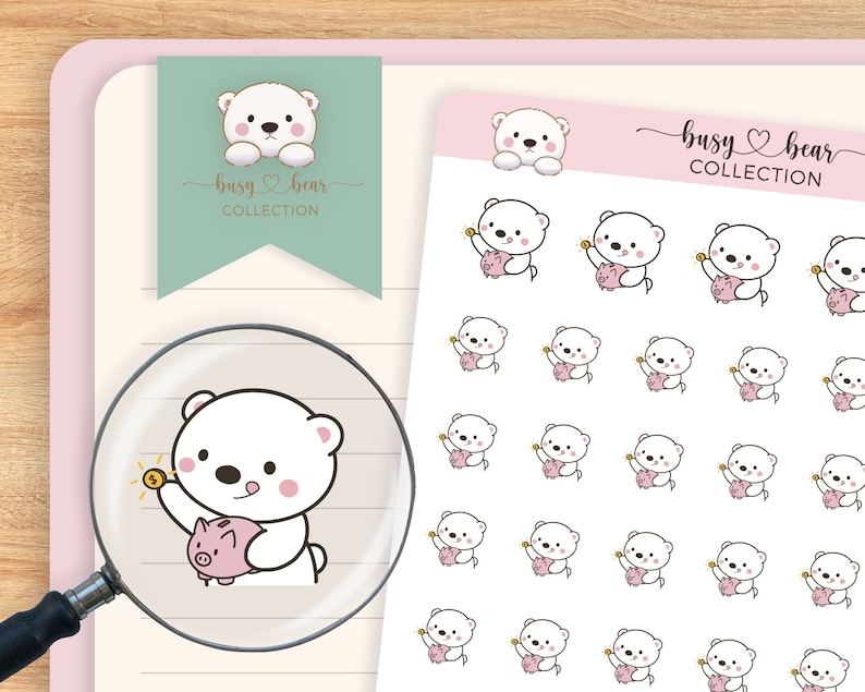 May include: A sheet of stickers featuring a white polar bear holding a pink piggy bank and a gold coin. The stickers are part of the "busy bear collection".
