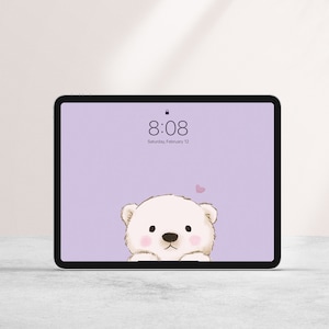 May include: A purple iPad screen with a white polar bear peeking out from the bottom. The time is 8:08 and the date is Saturday, February 12.