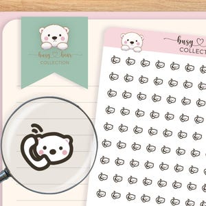 May include: A sheet of stickers featuring a white bear holding a phone. The stickers are arranged in a grid pattern on a pink background. The text "busy bear collection" is printed in black at the top of the sheet.