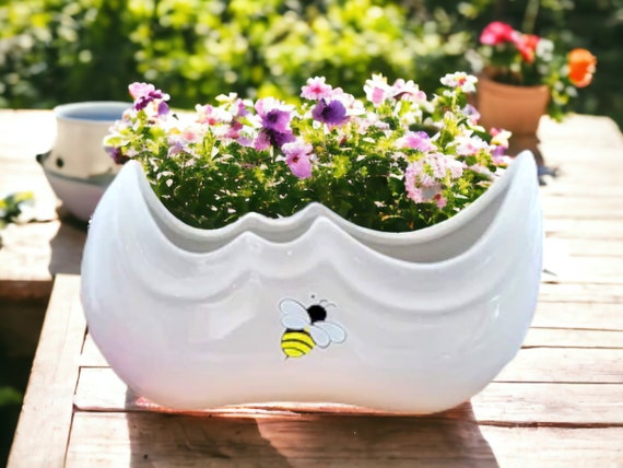 self-watering cedar planter 23 in. x 49 in. x 30 in. H Self-Watering Elevated Cedar Planter