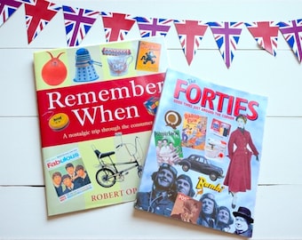 May include: Two books with vibrant covers, one titled "Remember When" and the other "The Forties." The "Remember When" book features a red cover with nostalgic imagery. The "The Forties" book has a blue cover with 1940s images. Union Jack bunting is in the background.