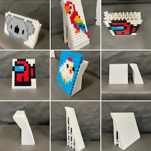 May include: A collection of pixel art sculptures, including a koala, parrot, and chicken, constructed from white and colored blocks. The sculptures are displayed on white stands, showcasing various designs and characters.