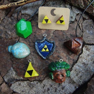 Zelda Pendants made from Avocado Pits [Triforce, Korok, Deku Tree, Hyrule, Shield, Rupee, Wind Waker, Gamer, Fanart, Jewelry, Necklace, DIY]
