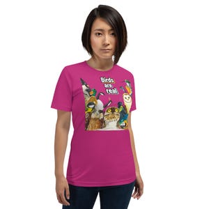 May include: A set of three ceramic mugs with a speckled, matte finish. The mugs are in shades of cream, light gray, and dark gray. Each mug has a simple, minimalist design, perfect for coffee or tea.