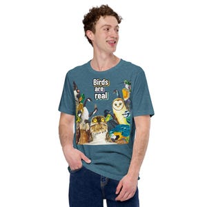 May include: A set of three ceramic mugs with a speckled, matte finish. Each mug features a different color: light blue, cream, and gray. The mugs have a simple, modern design and a comfortable handle.