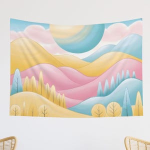 May include: A tapestry featuring a colorful landscape with rolling hills in shades of pink, yellow, and blue. The hills are dotted with trees and a large, round sun in the sky.