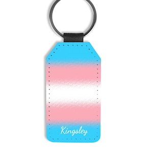Personalized transgender keychain; Custom name trans pride flag keyring; Customized MTF or FTM merch; Original LGBT gifts under 25