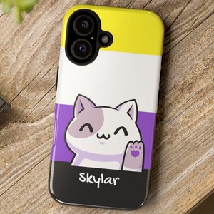 May include: A black phone case with a yellow, white, and purple design. The design features a cartoon cat with a purple paw print. The text "skylar" is printed on the bottom of the case.