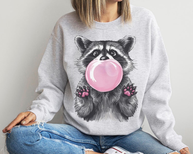 funny raccoon with pink bubblegum sweatshirt