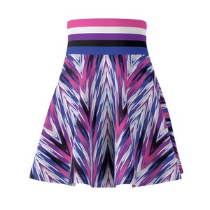 May include: A purple, pink, white and black skater skirt with a geometric pattern. The waistband features a pink, white, black and blue stripe.