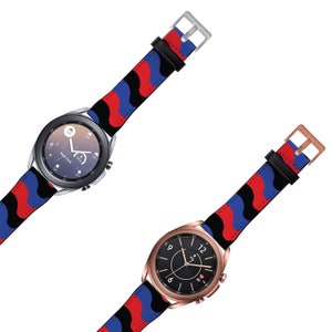 May include: Two smartwatch bands with a red, blue, and black camouflage pattern. The bands are shown attached to two different smartwatches, one with a silver case and one with a rose gold case.
