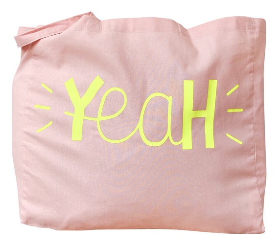 Pink written bag hotsell