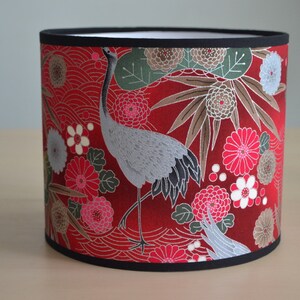 Round lampshade in red, fuchsia pink, silver and green Japanese fabric with a crane bird and flower motif; suitable for table lamps, floor lamps, and ceiling lights. image 3