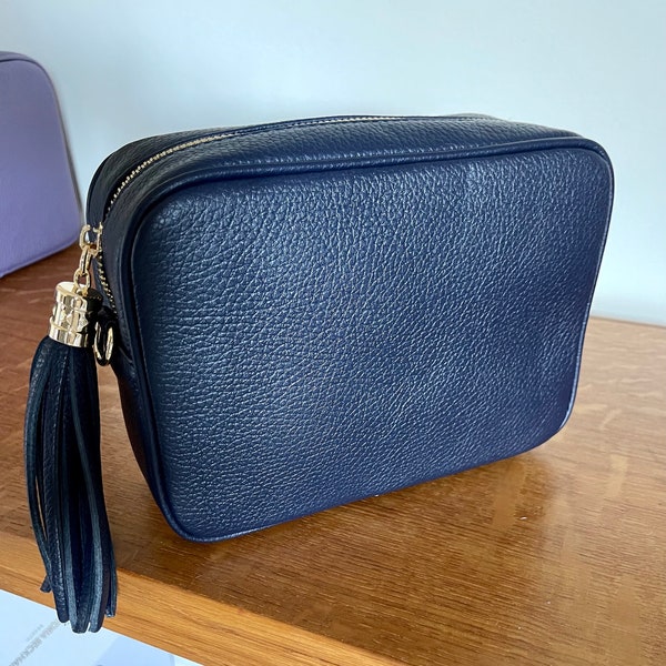 Cross Body Camera Bag Italian Leather Adjustable strap and Tassel.  Plenty of room for all your essentials  A really beautiful bag Navy Blue