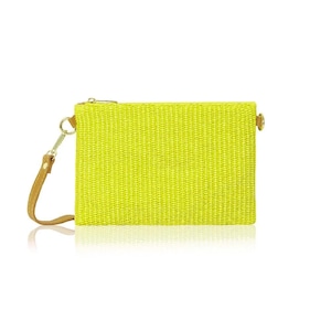 May include: A rectangular neon yellow woven clutch bag featuring a textured straw-like surface, a gold-tone metal zip closure along the top, and a detachable tan leather wrist strap attached to a gold-tone metal ring on the left side.