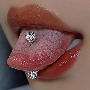 Gold tongue ring with diamond top
