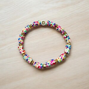 Pulsera con la letra D