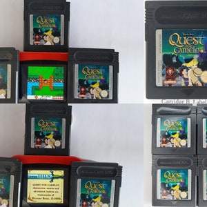 May include: A collection of ten black Game Boy Color cartridges for the video game "Quest for Camelot". The cartridges are arranged in two rows of five. The cartridges have a black plastic shell with a colorful label featuring the game's title and characters. The label also includes the game's copyright information, "Warner Bros. 1998".