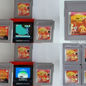 May include: A collection of eight video game cartridges for the Game Boy and Game Boy Advance. The cartridges are all for the game "The Lion King". The cartridges are arranged in two rows of four. The top row has four Game Boy cartridges, and the bottom row has four Game Boy Advance cartridges. The cartridges are all gray and have a picture of Simba from the movie "The Lion King" on the front.