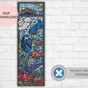 May include: A stained glass style illustration of characters from the film Finding Nemo. The characters include Dory, Marlin, Nemo, and a whale shark. The illustration is set against a blue background with bubbles and seaweed.
