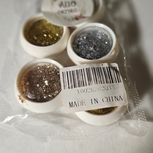 Fine powder glitter in 3 gold and two silver pots for nail bling and more. New