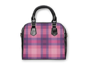 May include: A structured handbag with a plaid pattern in shades of pink and purple. The bag features black handles and trim, with gold-colored hardware accents. The design is a modern take on a classic style.