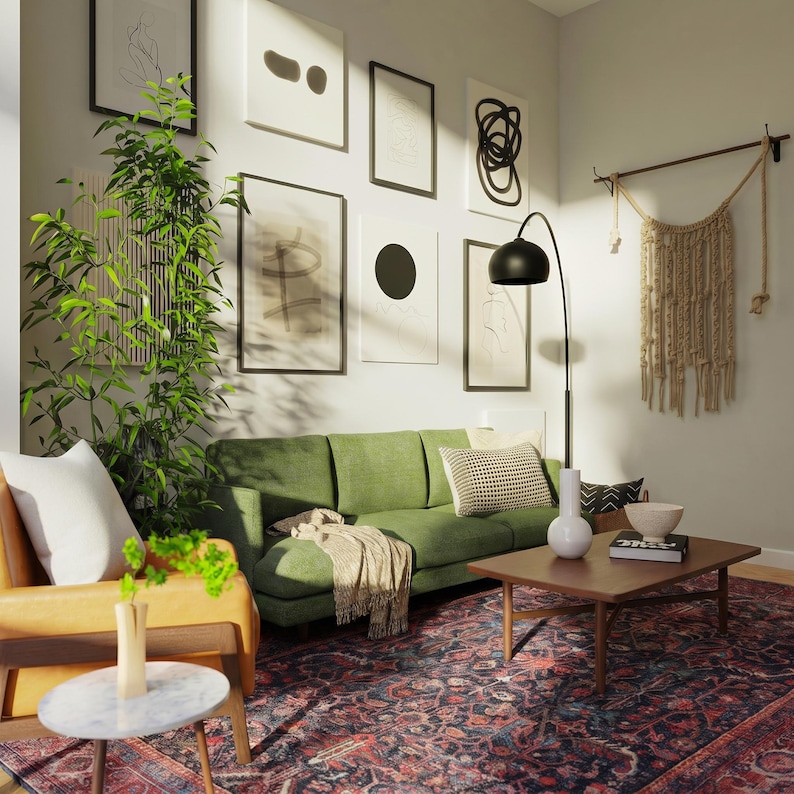 May include: A living room featuring a green sofa, a yellow armchair, a dark wood coffee table, and a patterned rug. The wall displays a gallery of framed abstract art prints, a tall floor lamp, and a hanging macrame wall tapestry.