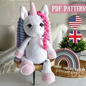 May include: Crochet pattern for a white unicorn amigurumi toy with pink and purple yarn mane and tail. The pattern is available in English and British English. PDF PATTERN.