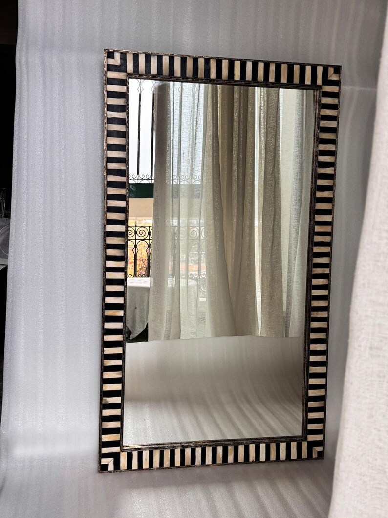 Full shot of the rectangular bone inlay mirror showcasing its overall proportions and decorative frame.