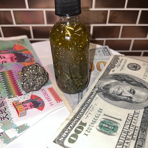 Money come to me/Money stay with me oil