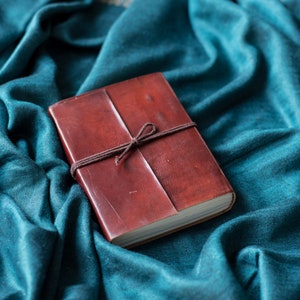 Leather and recycled paper notebook