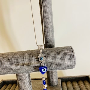Evil Eye charm on necklace chain