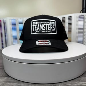 Teamsters License Plate Embroidered trucker hat.