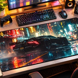 May include: A rectangular desk mat featuring a high-resolution print of a black sports car on a wet city street at night. The scene includes vibrant neon lights, reflections on the pavement, and a futuristic urban atmosphere with red taillights.